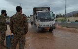 گزارش تصویری/ضدعفونی کردن خودروهای جاده لار-جهرم توسط گروه جهادی گردان۴۰۱ ابوذر